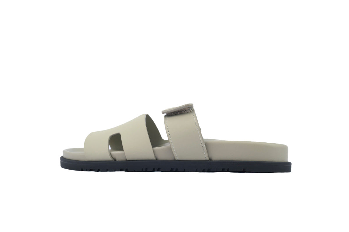 Hermès Chypre Slide Sandals in Light Beige Leather