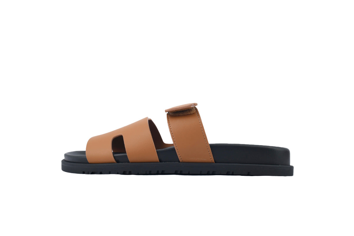 Hermès Chypre Slide Sandals in Tan Leather