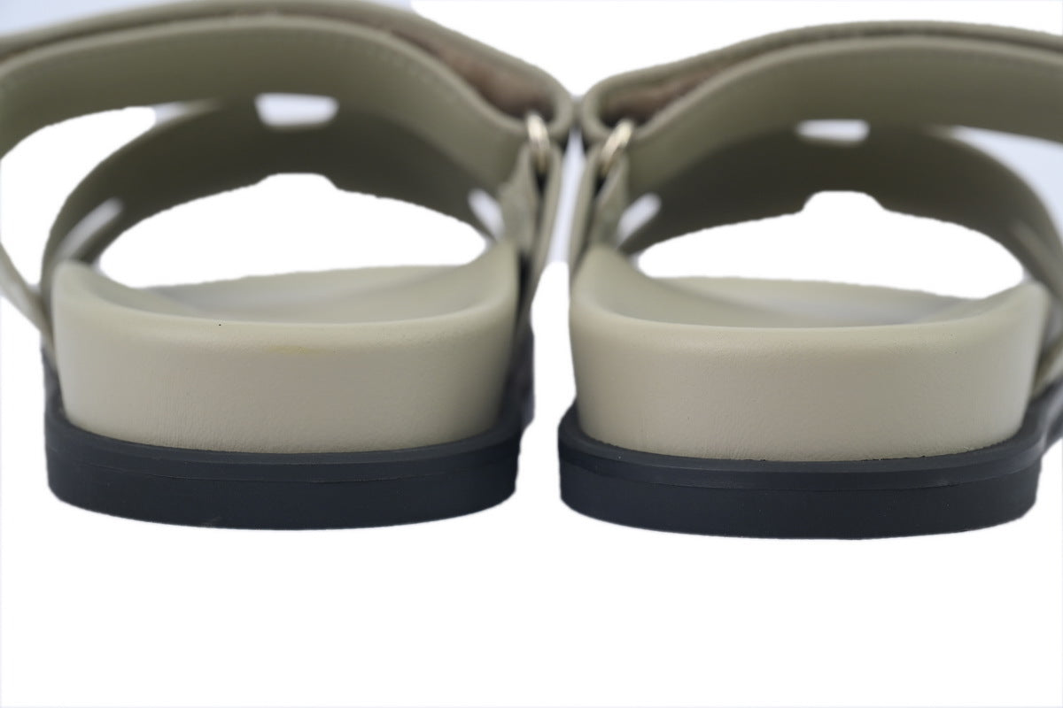 Hermès Chypre Slide Sandals in Light Beige Leather