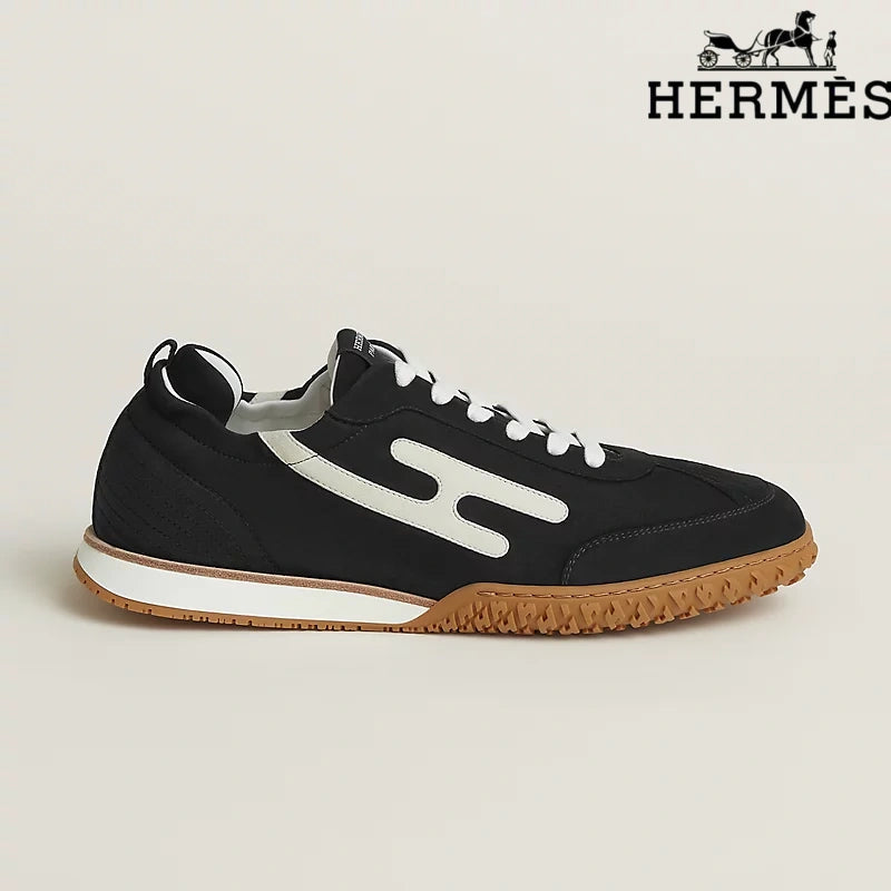 Hermès Black and White Bouncing Sneakers