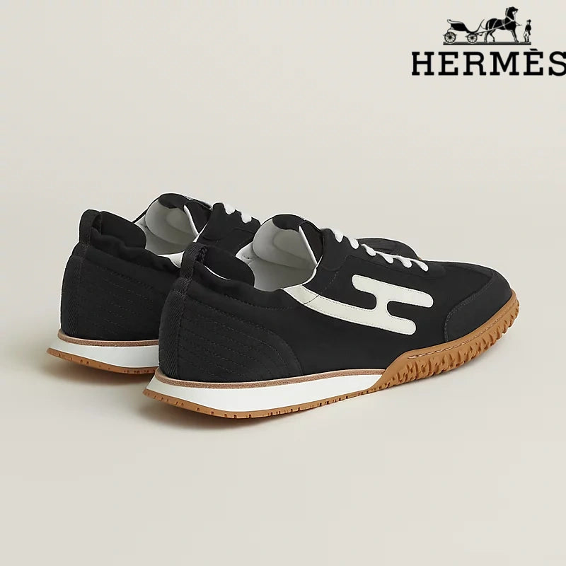 Hermès Black and White Bouncing Sneakers