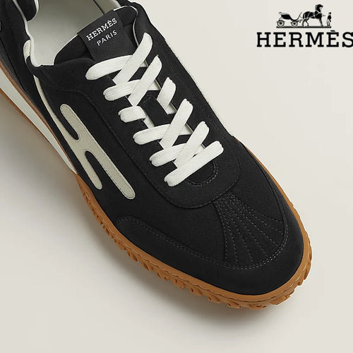 Hermès Black and White Bouncing Sneakers