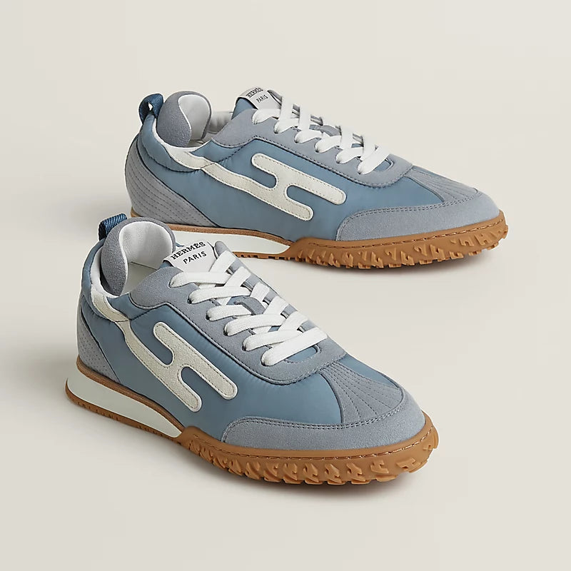 Hermès Bouncing Mixed-Material Sneakers in Light Blue