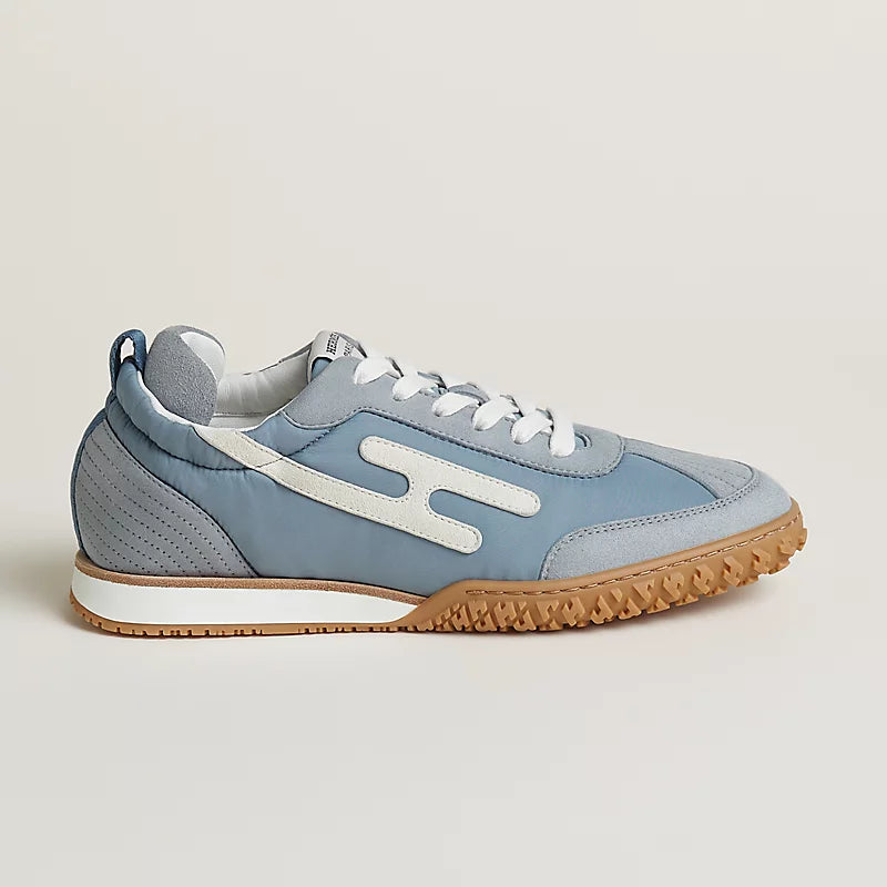 Hermès Bouncing Mixed-Material Sneakers in Light Blue