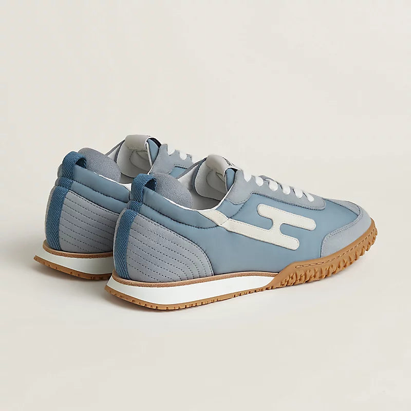 Hermès Bouncing Mixed-Material Sneakers in Light Blue