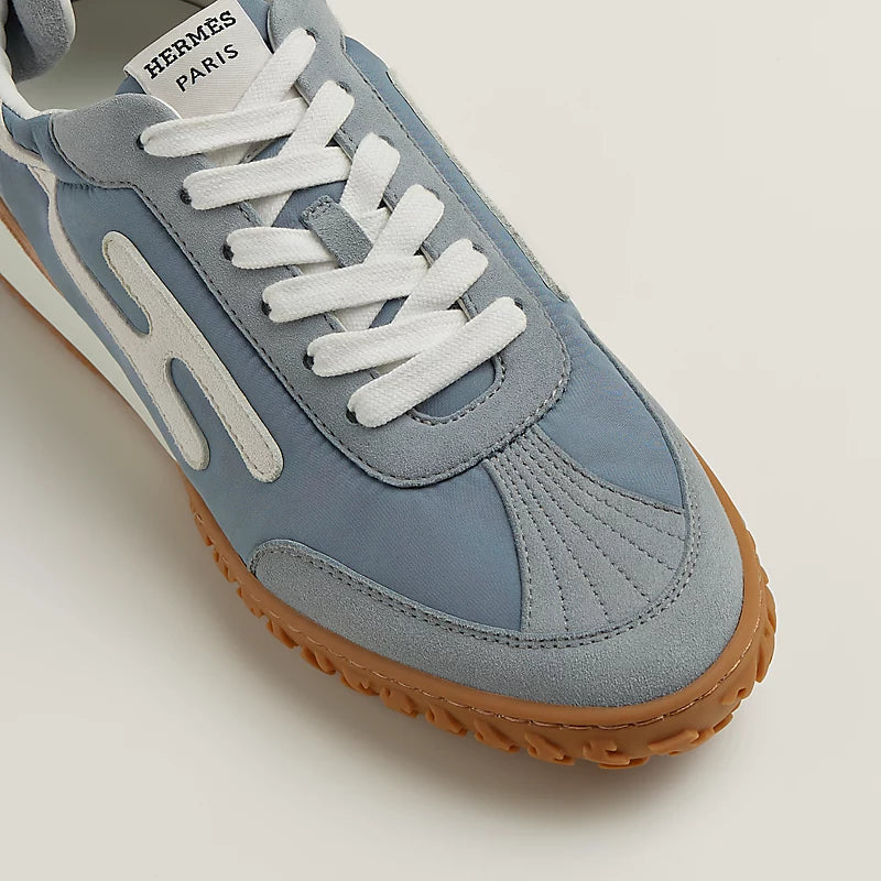 Hermès Bouncing Mixed-Material Sneakers in Light Blue
