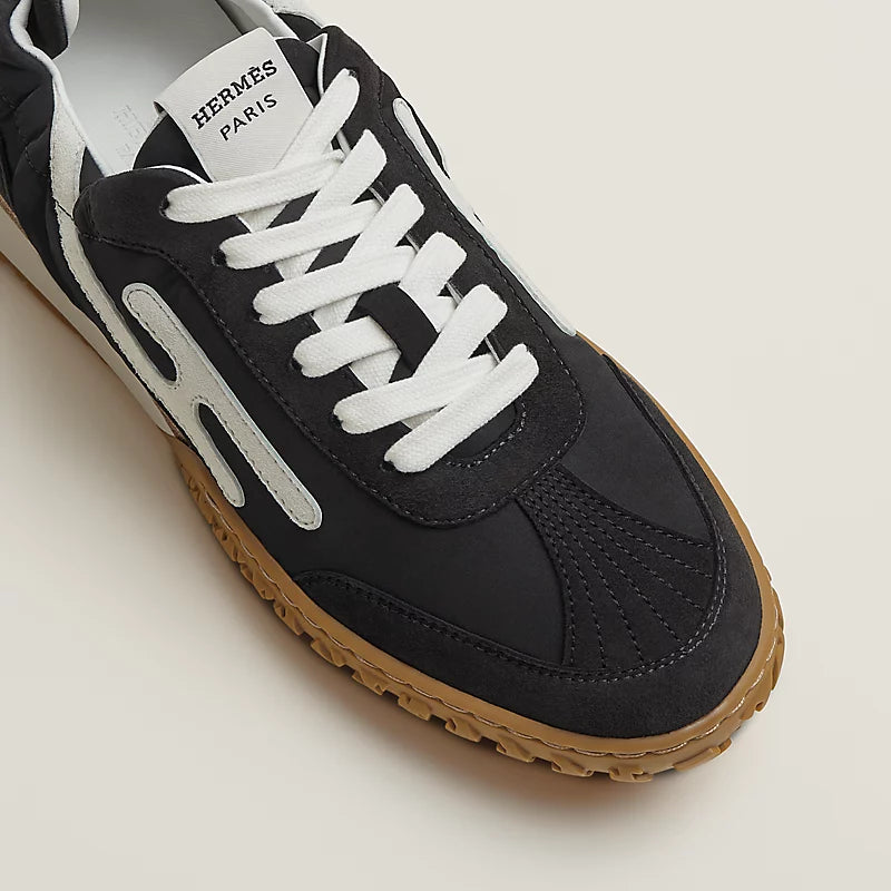 Hermès Bouncing Mixed-Material Sneakers in Black & White