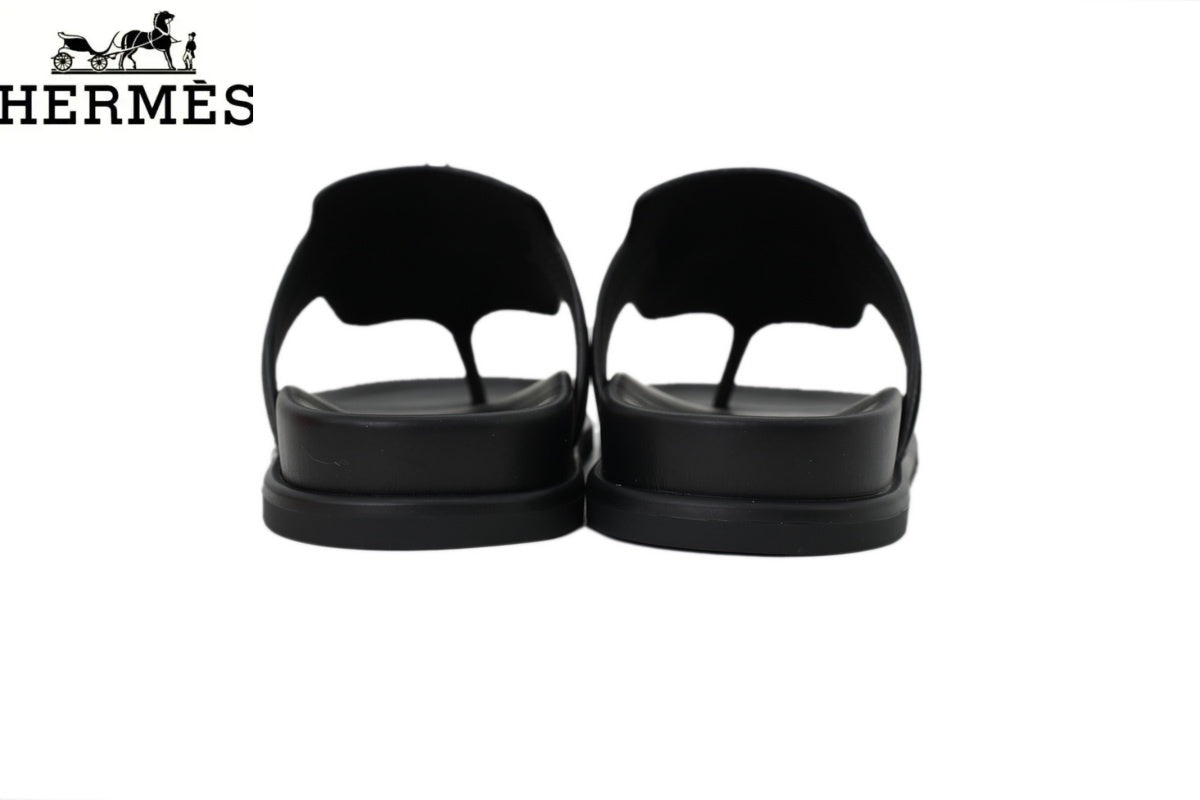 Hermès Black Leather Flip-Flop Slide with Metal Buckle