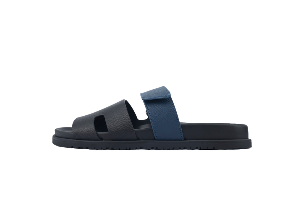 Hermès Chypre Slide Sandals in Black and Navy