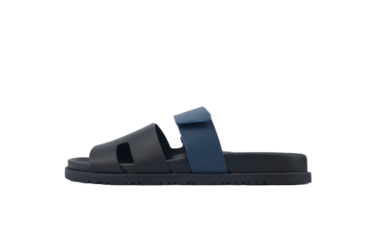Hermès Chypre Slide Sandals in Black and Navy