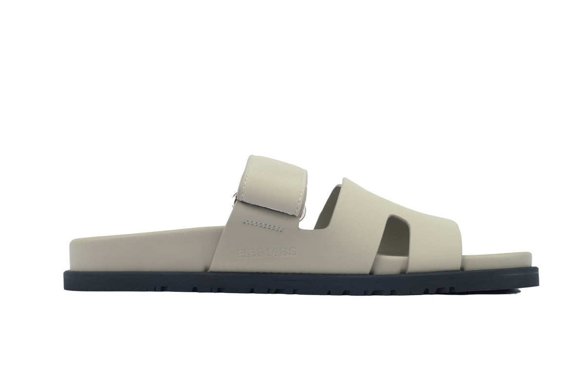 Hermès Chypre Slide Sandals in Light Beige Leather
